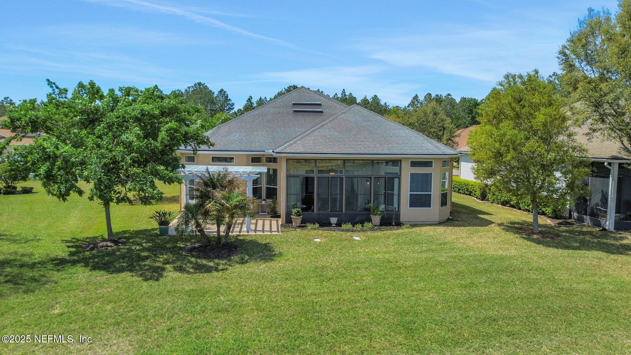 1016 Inverness Drive St. Augustine, FL 32092 - Photo 4 of 59 a front view of a house with a garden