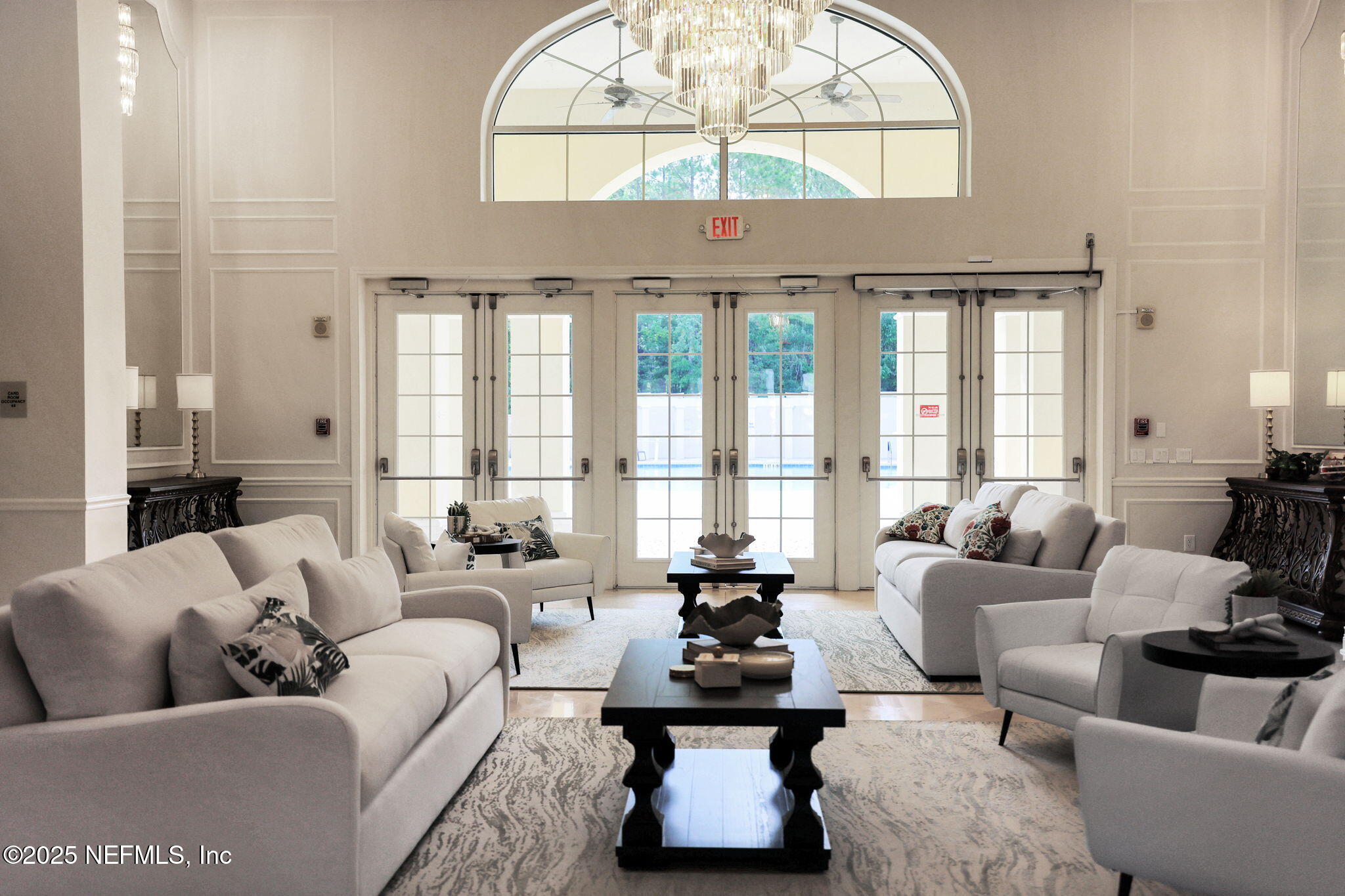 1016 Inverness Drive St. Augustine, FL 32092 - Photo 41 of 59 a living room with furniture and a large window