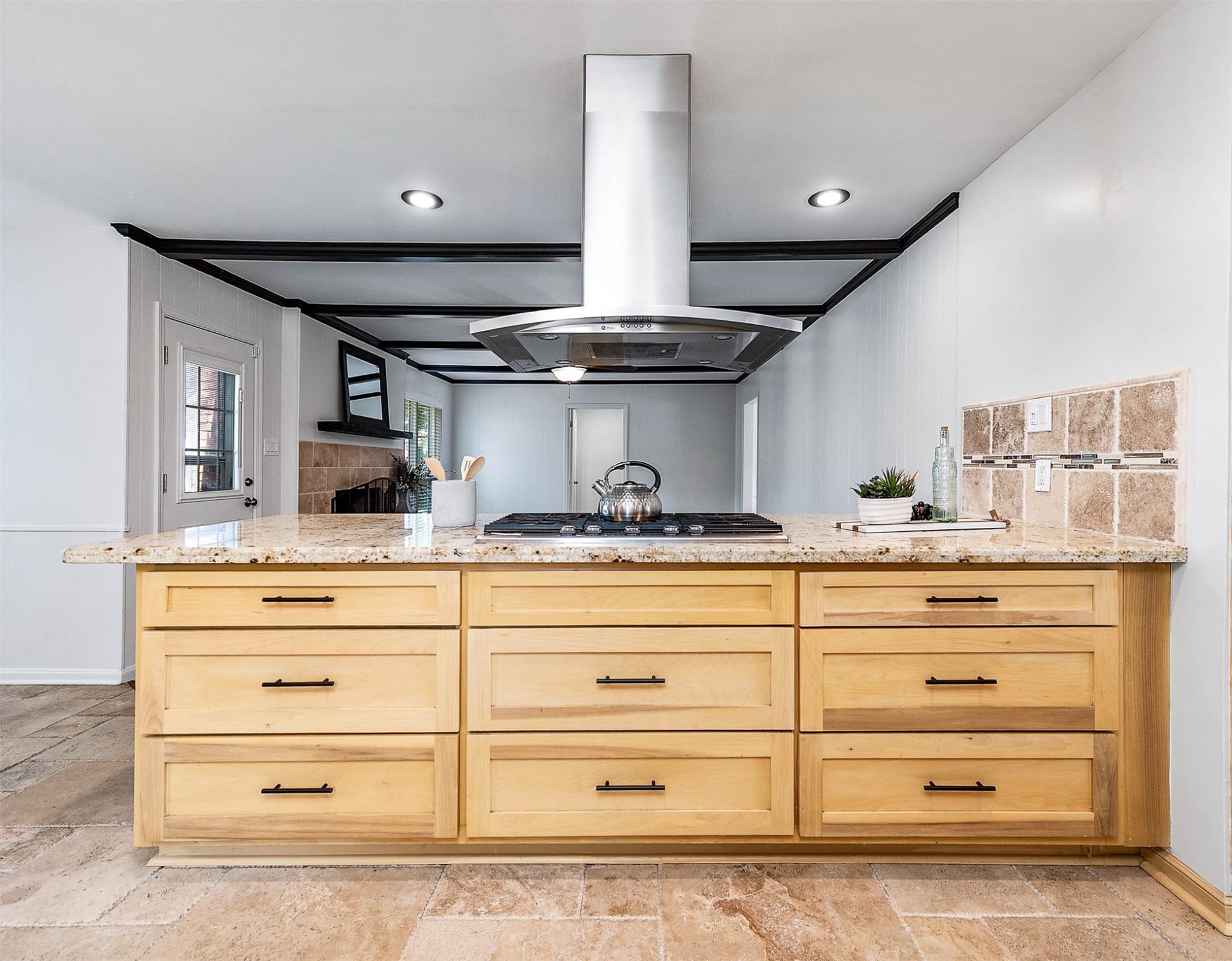 2103 Southwick Street Houston, TX 77080 - Photo 12 of 49 a kitchen with cabinets appliances and a counter top