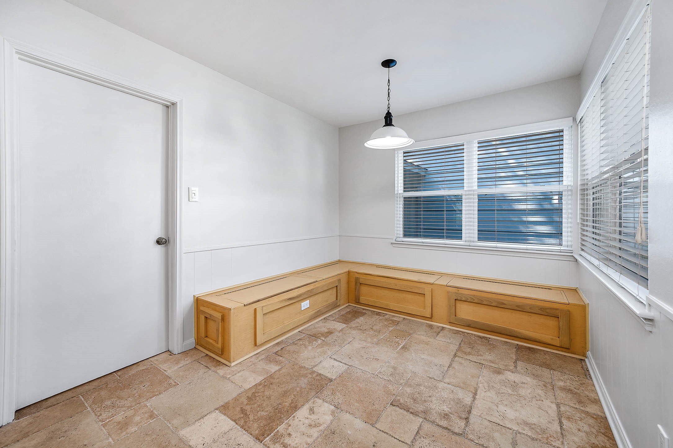 2103 Southwick Street Houston, TX 77080 - Photo 16 of 49 a view of room with window and a ceiling fan
