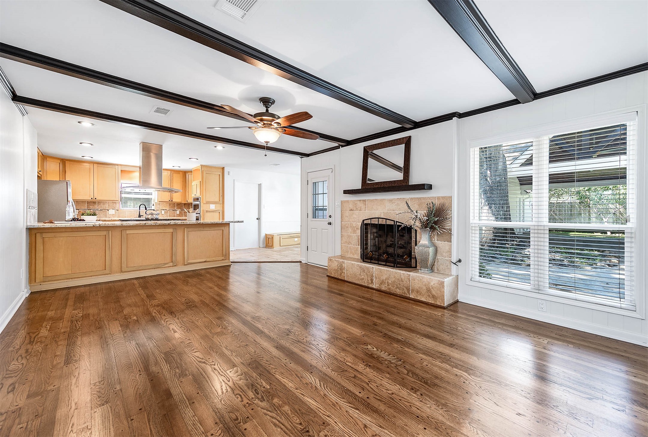 2103 Southwick Street Houston, TX 77080 - Photo 2 of 49 a view of a livingroom with a fireplace and window