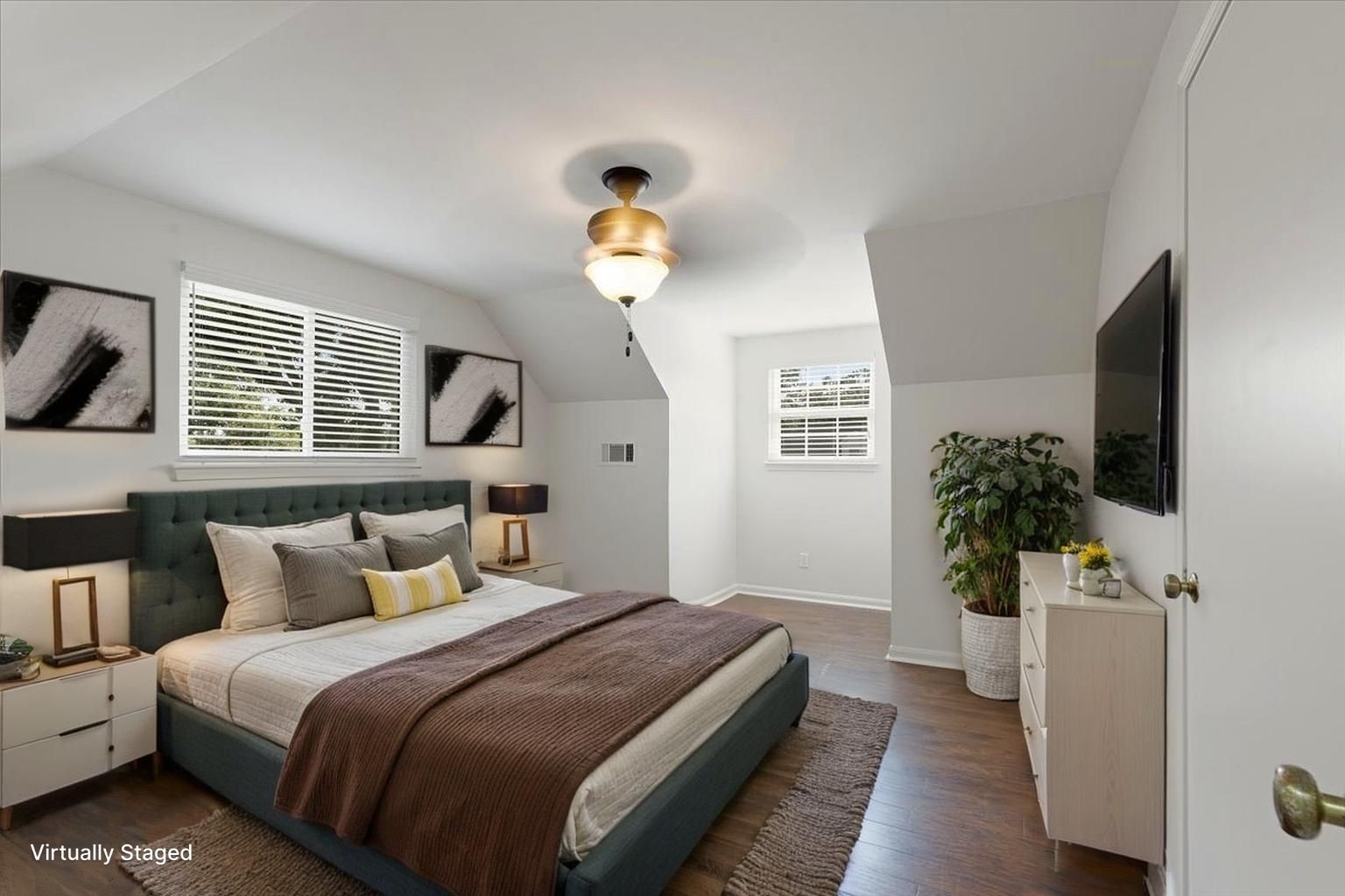 2103 Southwick Street Houston, TX 77080 - Photo 23 of 49 a bedroom with bed and a chandelier