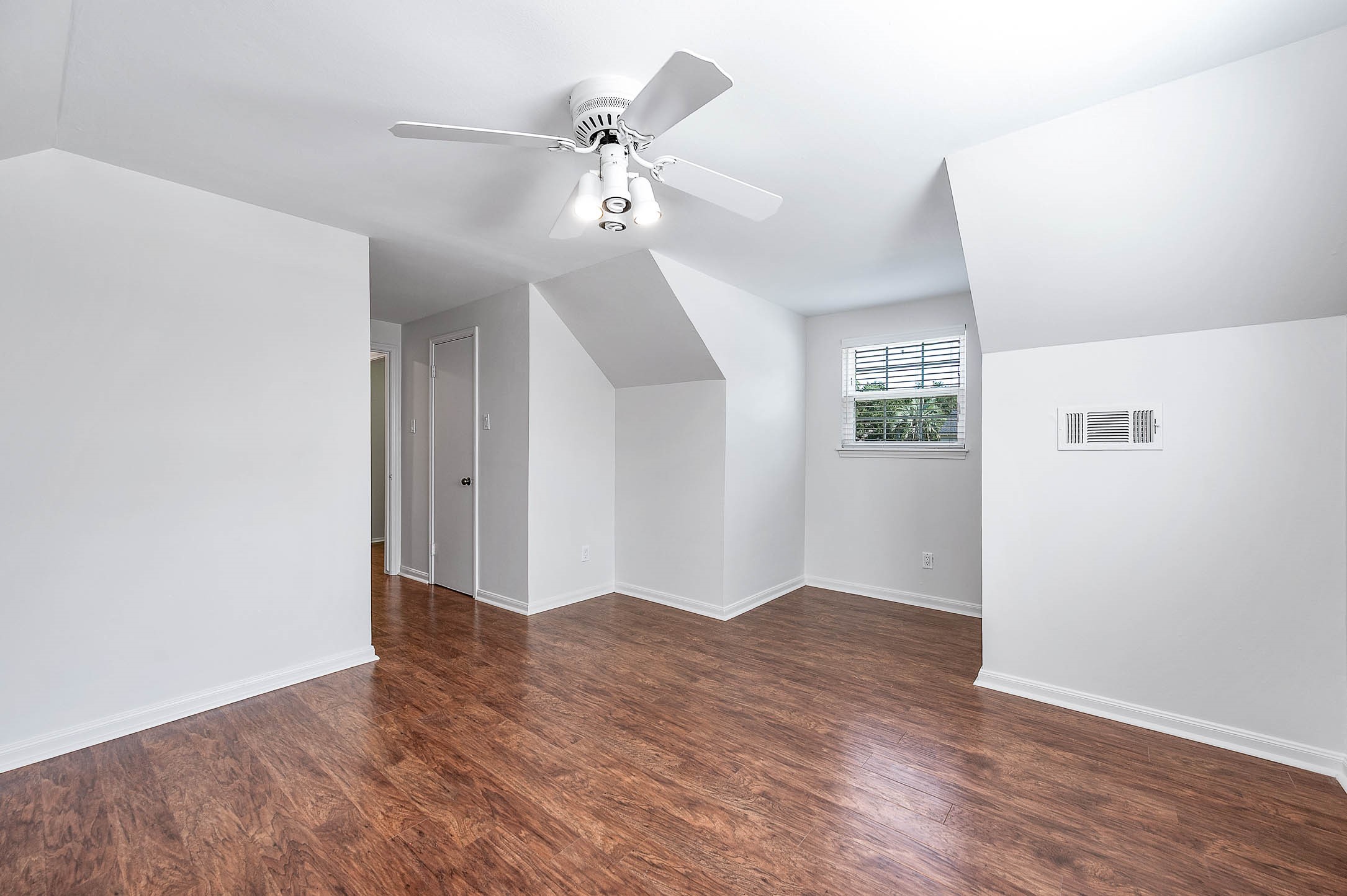 2103 Southwick Street Houston, TX 77080 - Photo 29 of 49 a view of empty room with wooden floor
