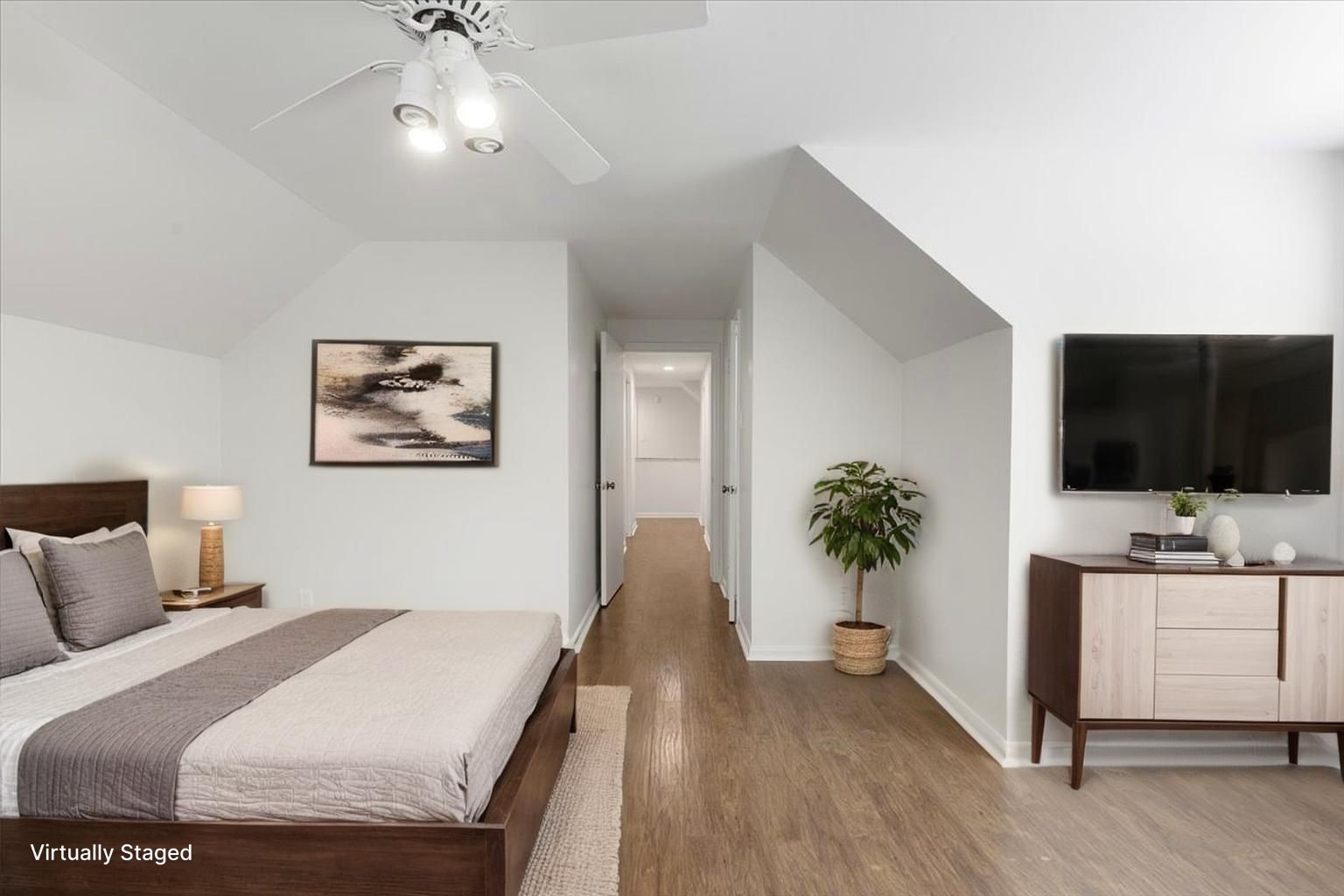 2103 Southwick Street Houston, TX 77080 - Photo 30 of 49 a bedroom with a bed and a flat screen tv