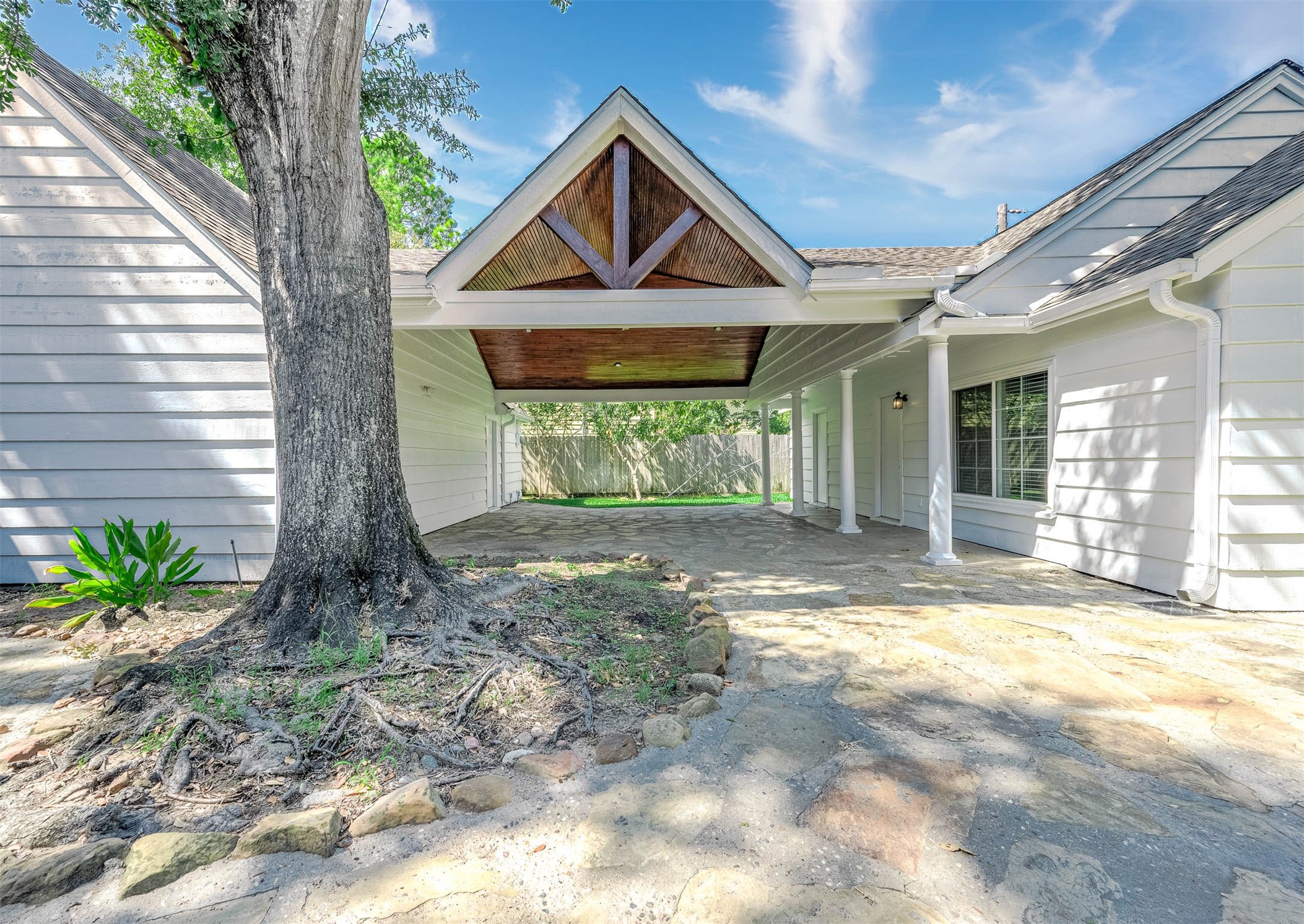 2103 Southwick Street Houston, TX 77080 - Photo 38 of 49 a front view of a house with garden