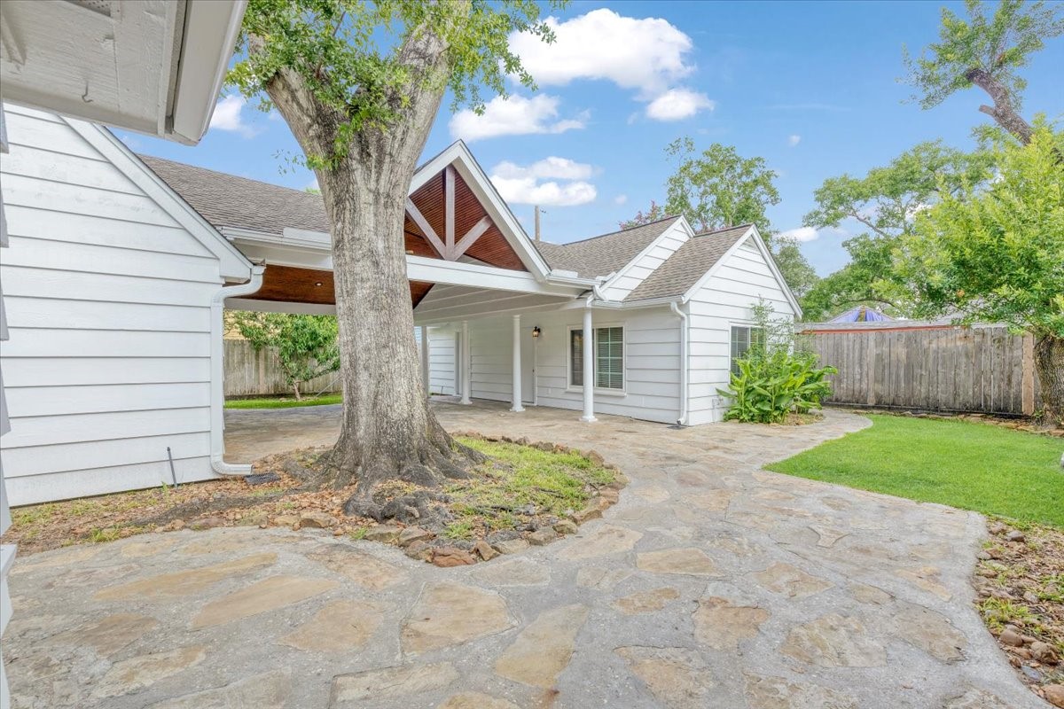 2103 Southwick Street Houston, TX 77080 - Photo 40 of 49 a front view of a house with garden