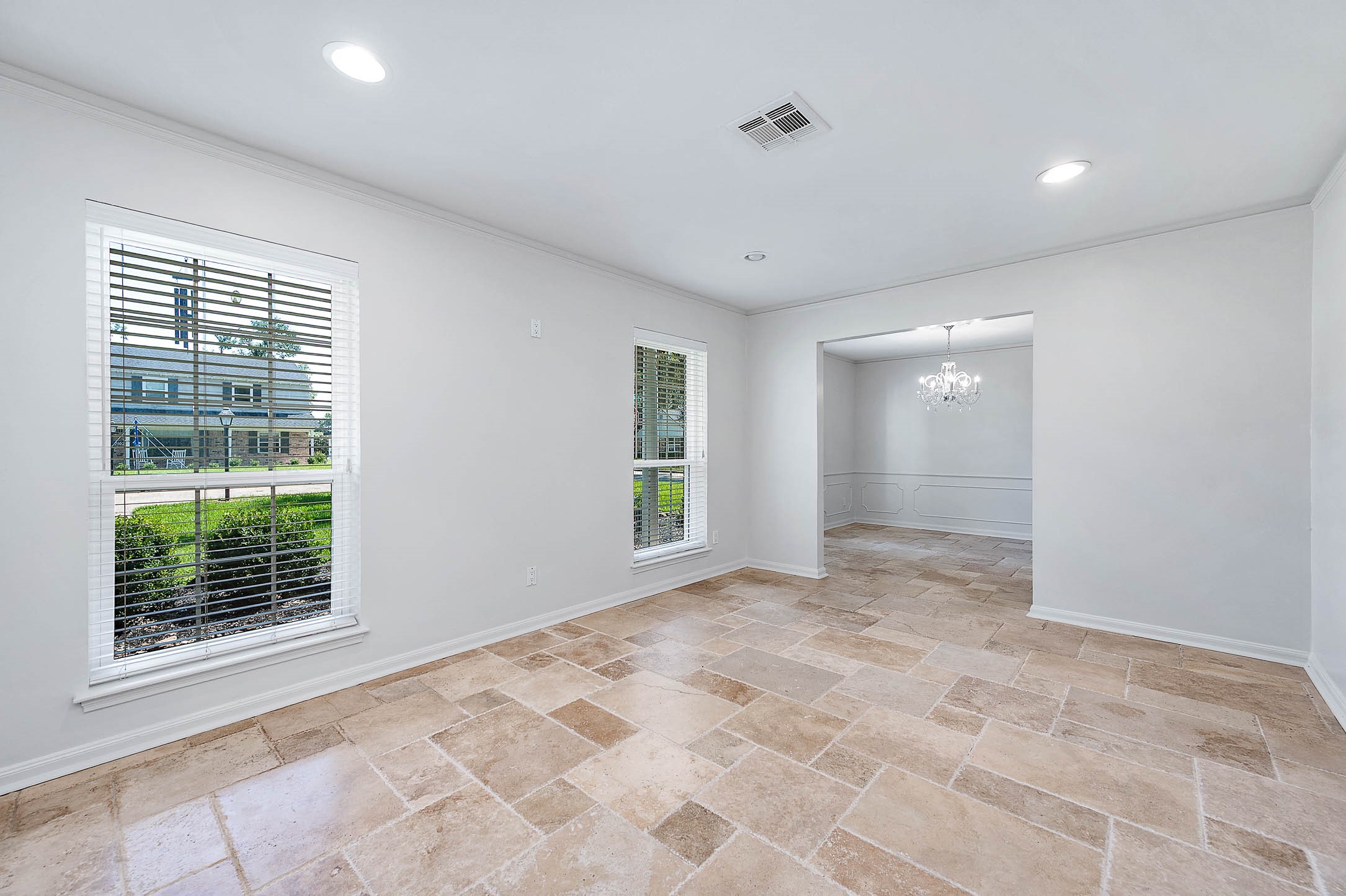 2103 Southwick Street Houston, TX 77080 - Photo 7 of 49 a view of an empty room with a window