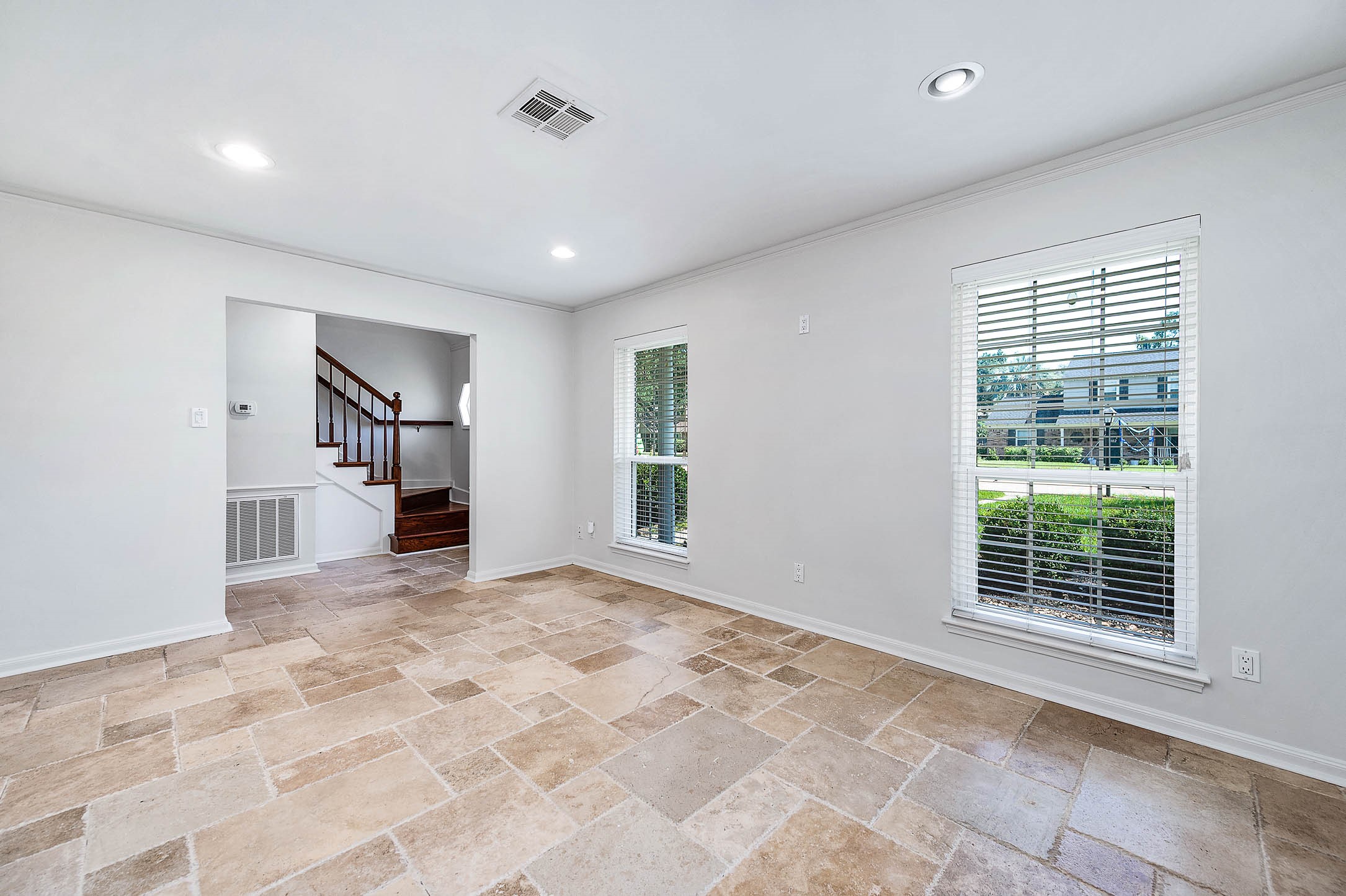 2103 Southwick Street Houston, TX 77080 - Photo 9 of 49 a view of an empty room with a window