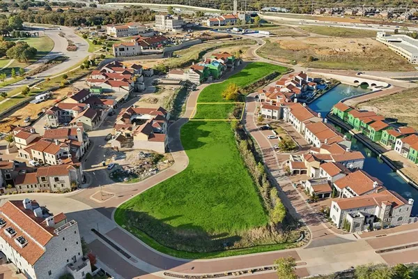 an aerial view of a house with a garden