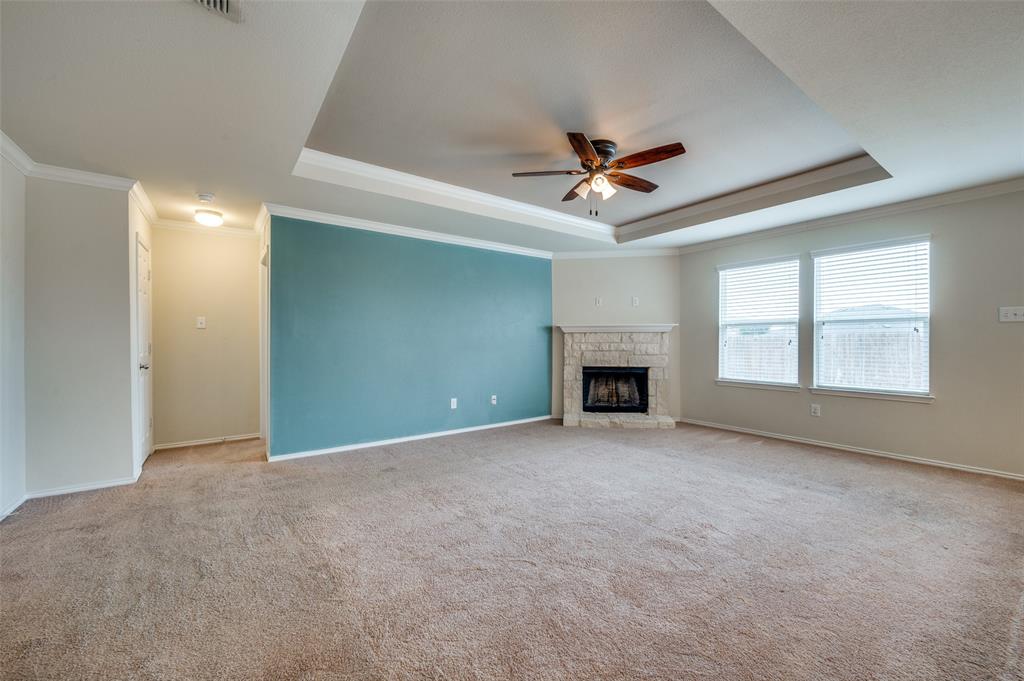 1420 Rivers Creek Lane Little Elm, TX 75068 - Photo 3 of 25 a view of an empty room with a fireplace and a window