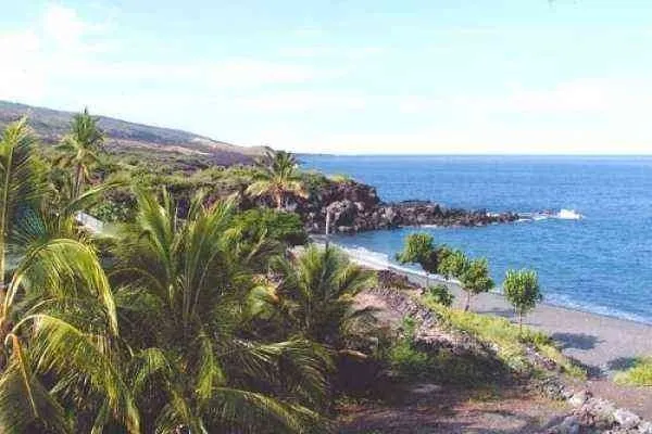 a view of a lake with a mountain in the background