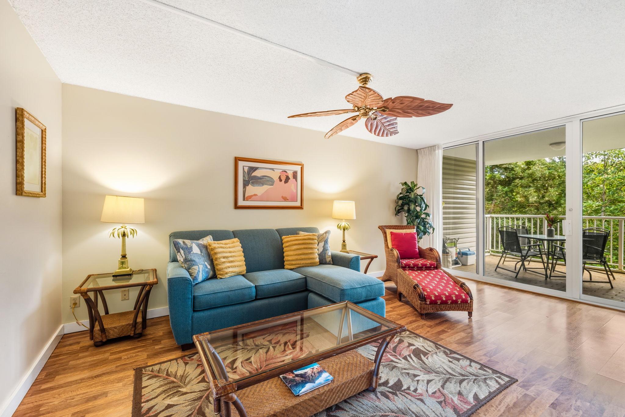 3811 Edward Road, Unit 1206 Princeville, HI 96722 - Photo 19 of 30 a living room with furniture and a large window
