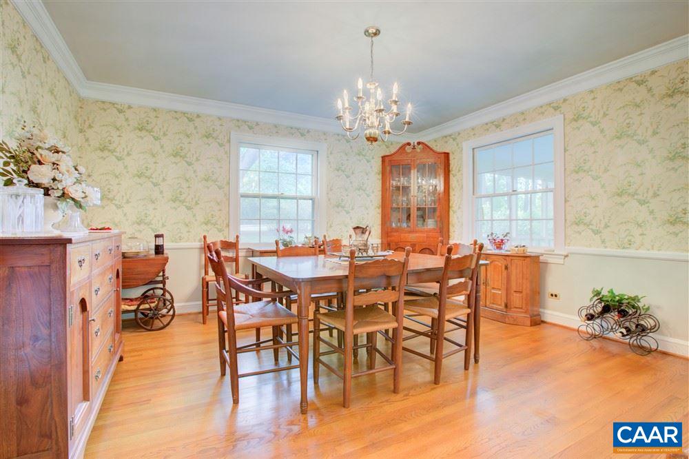2808 Northfield Road Charlottesville, VA 22901 - Photo 12 of 30 a view of a dining room with furniture window and wooden floor