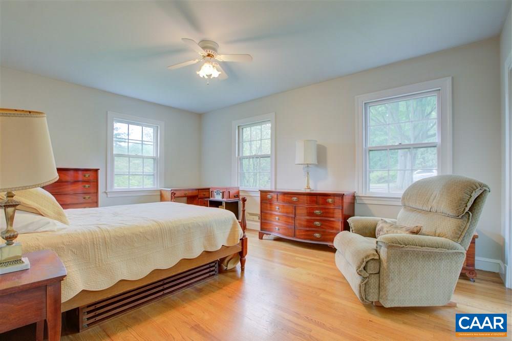2808 Northfield Road Charlottesville, VA 22901 - Photo 13 of 30 a bedroom with furniture and a large window