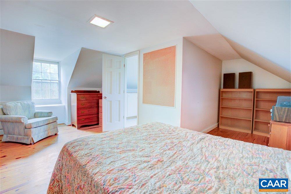 2808 Northfield Road Charlottesville, VA 22901 - Photo 21 of 30 a bedroom with a bed and a cabinets