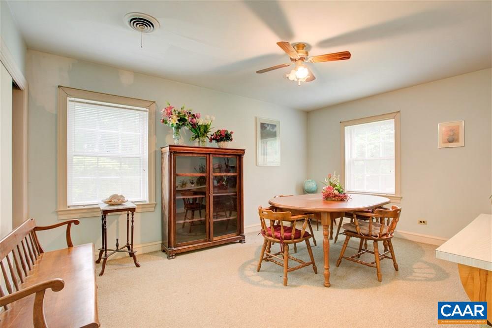 2808 Northfield Road Charlottesville, VA 22901 - Photo 25 of 30 a view of a dining room with furniture and a window