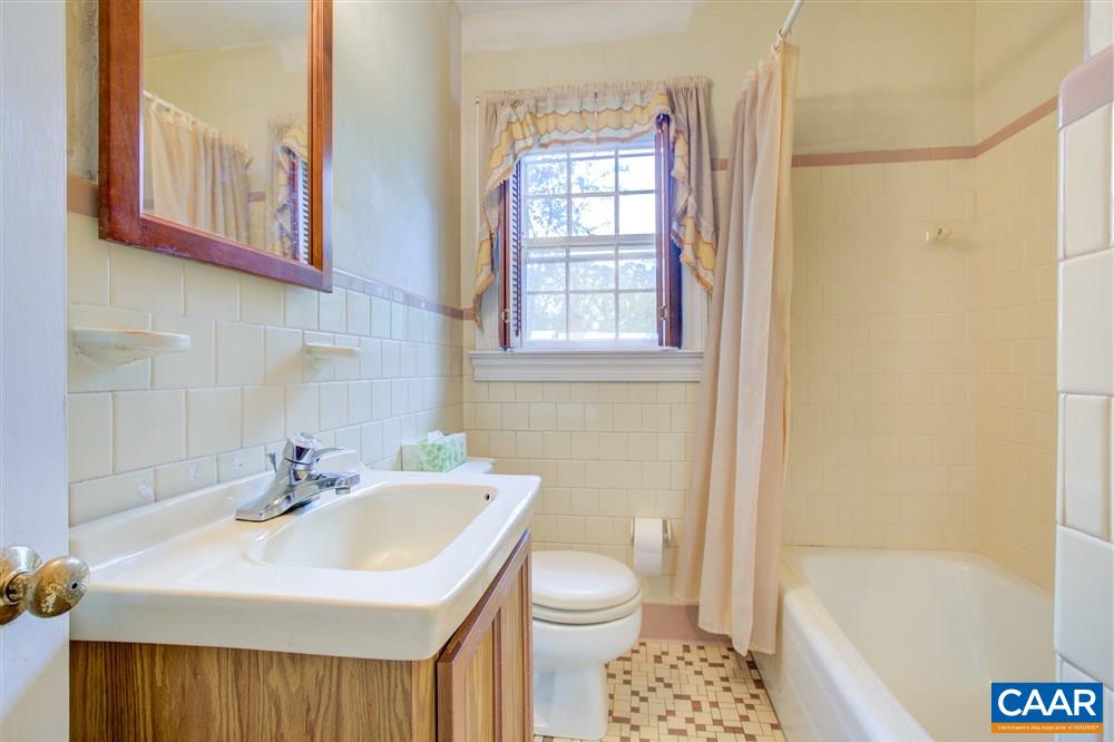 2808 Northfield Road Charlottesville, VA 22901 - Photo 27 of 30 a bathroom with a sink a toilet and shower