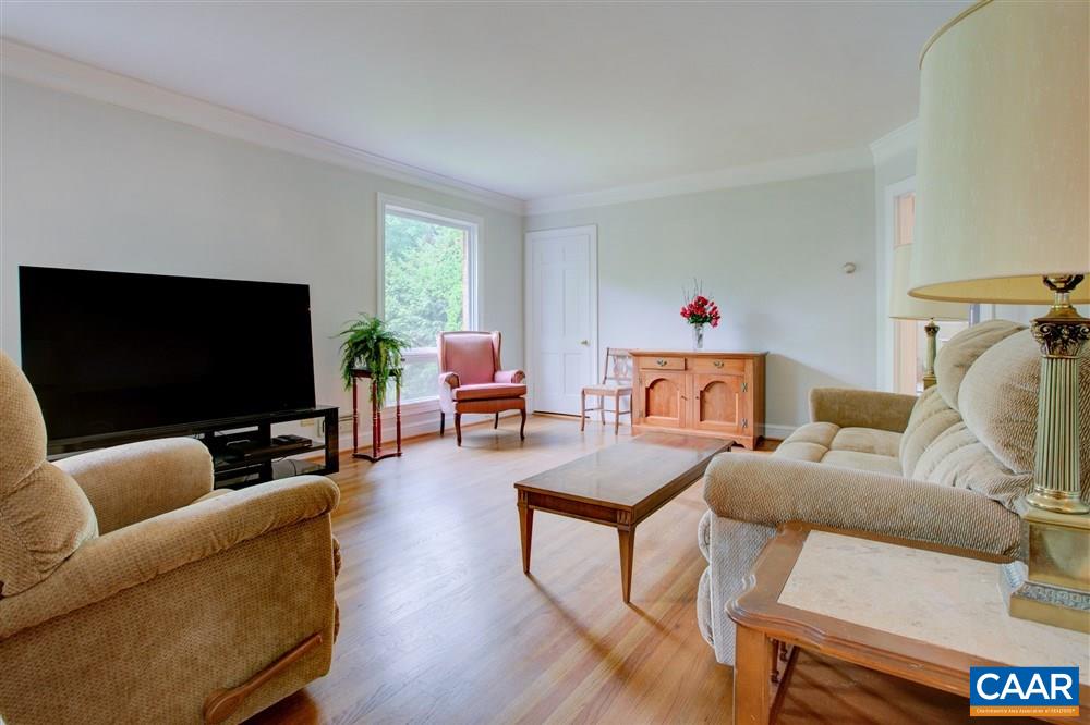 2808 Northfield Road Charlottesville, VA 22901 - Photo 5 of 30 a living room with furniture and a flat screen tv