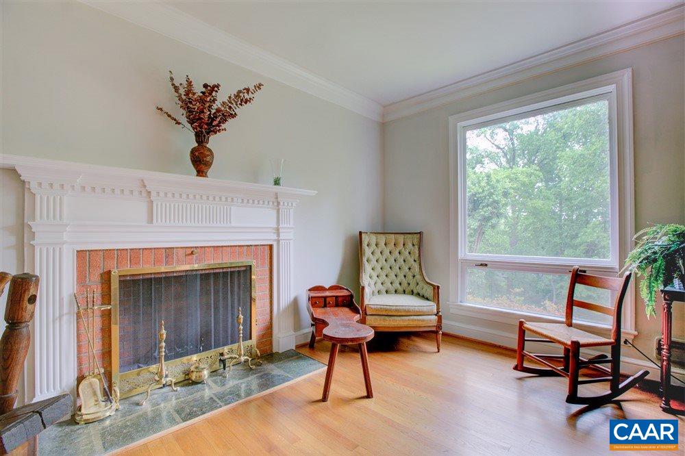 2808 Northfield Road Charlottesville, VA 22901 - Photo 7 of 30 a living room with furniture and a fireplace