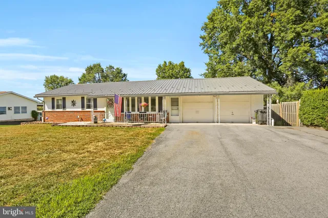 a view of a house with swimming pool
