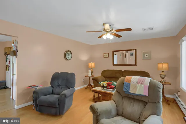 a living room with furniture and a couch