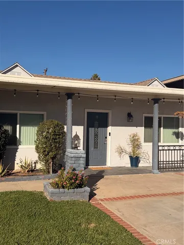 a front view of a house with porch