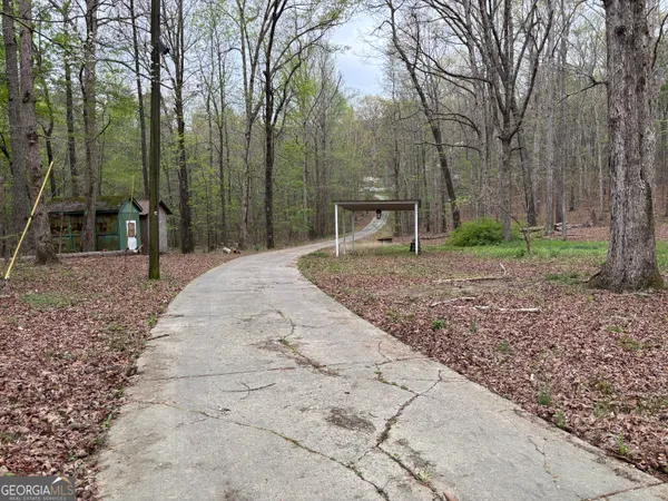 a backyard of a house with lots of green space