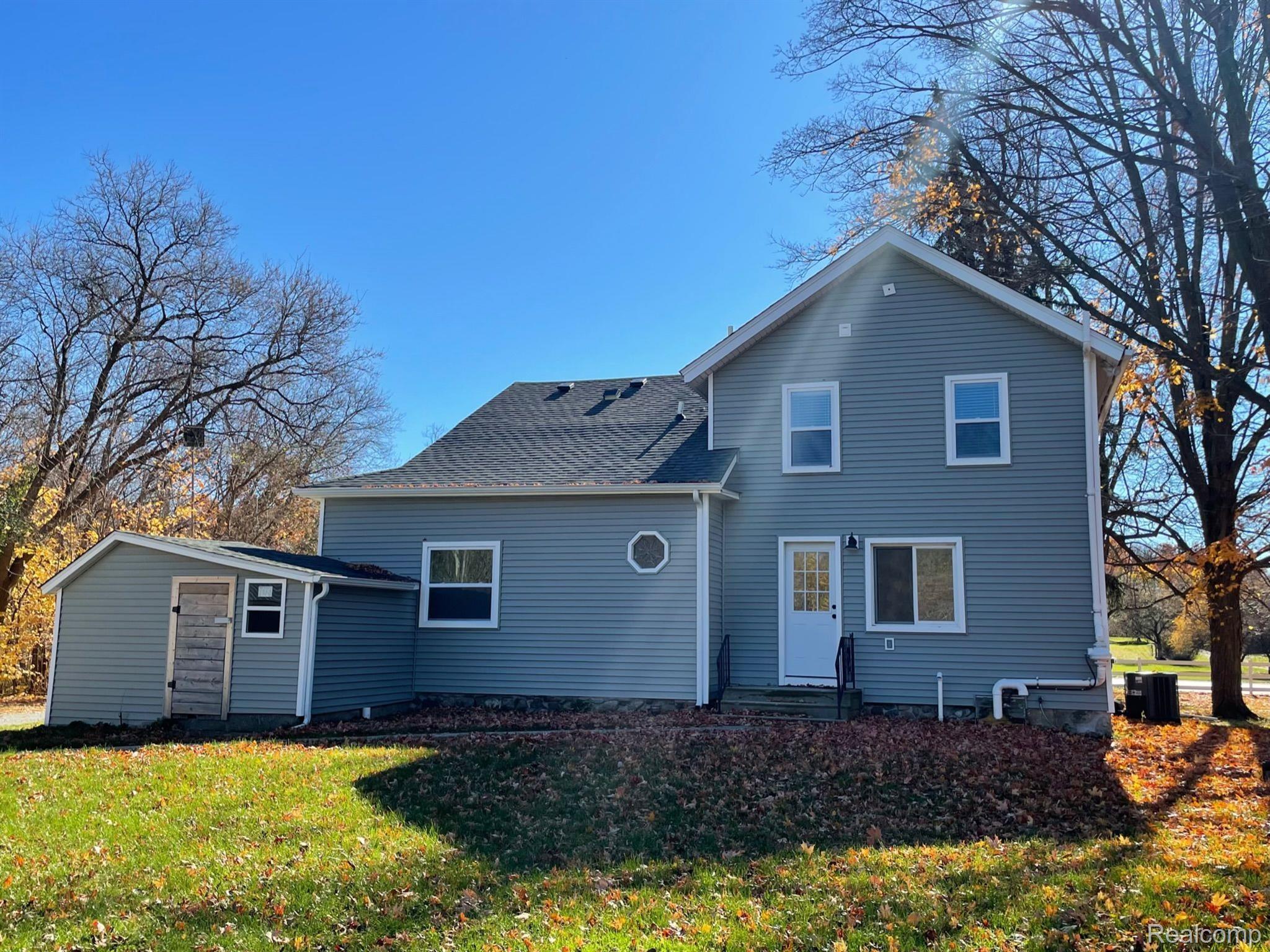 7273 Tucker Road Holly, MI 48442 - Photo 41 of 44 Back View of Home