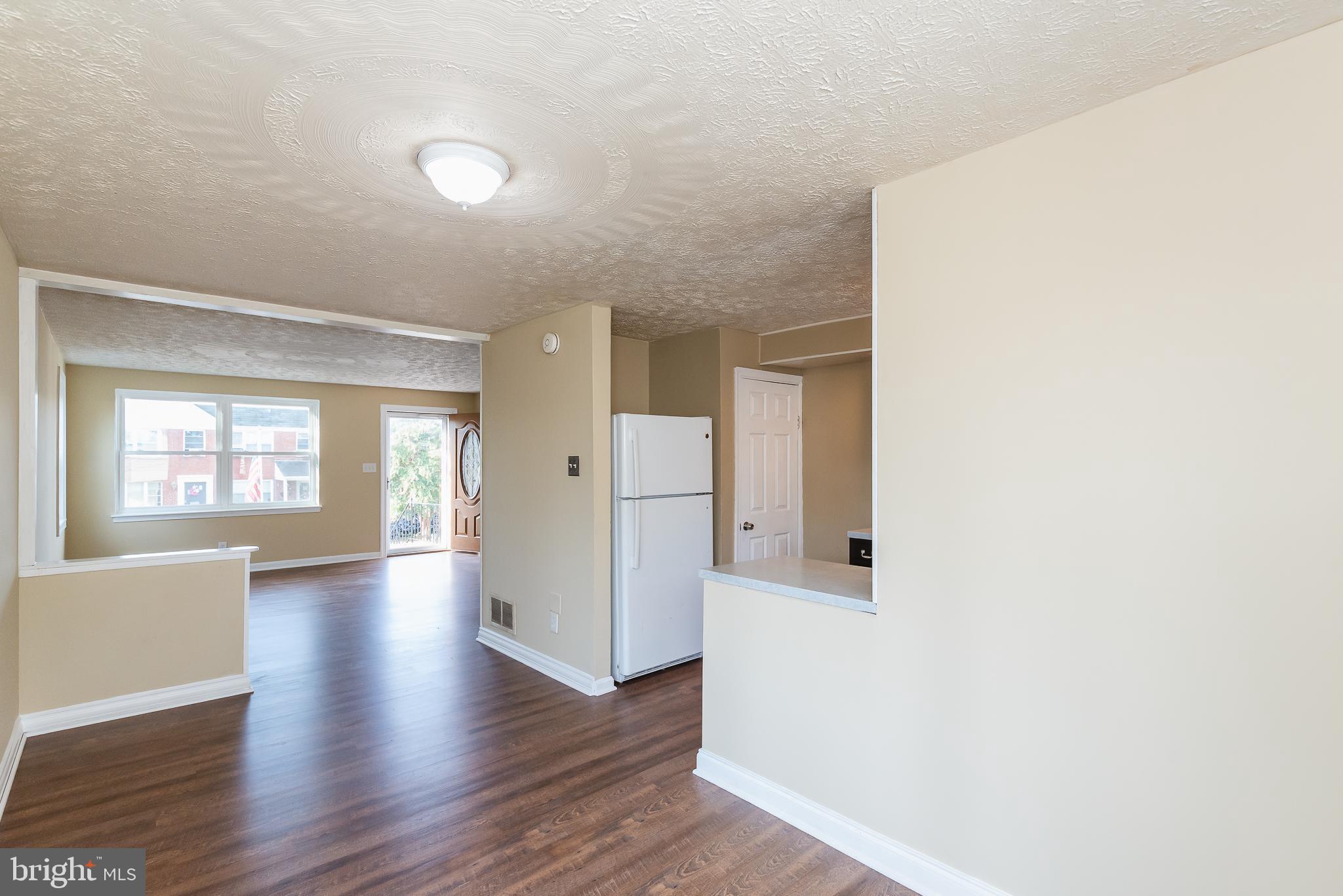 7446 Berkshire Road Baltimore, MD 21224 - Photo 10 of 47 Dining Room View into Living Room