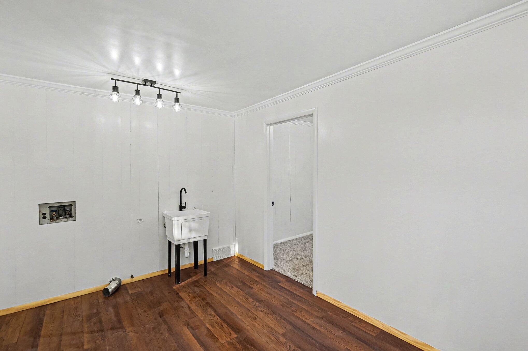 140 East Commerce Street Grant, MI 49327 - Photo 23 of 27 Laundry Area