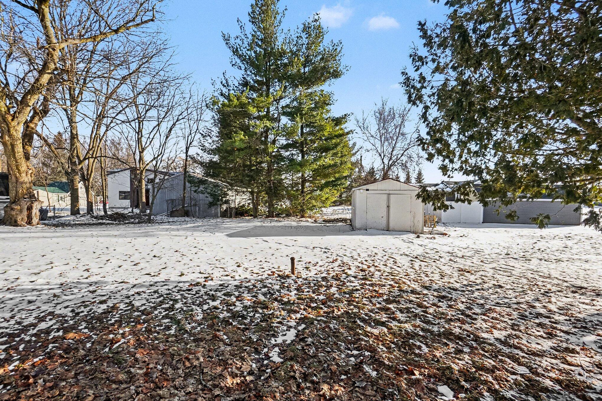 140 East Commerce Street Grant, MI 49327 - Photo 25 of 27 Backyard