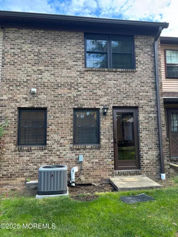 a view of residential houses with outdoor space