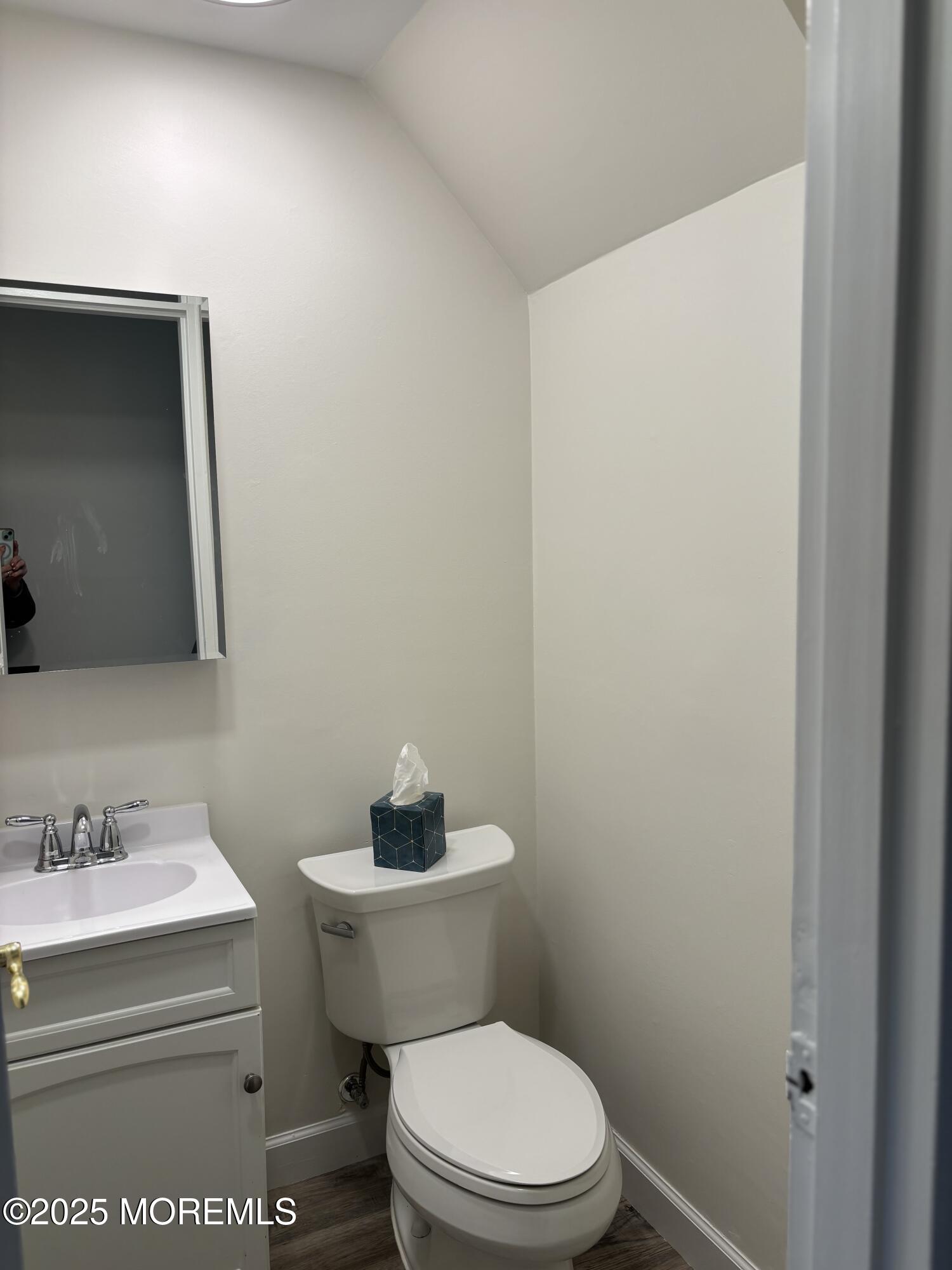 159 Village Green Way Hazlet, NJ 07730 - Photo 4 of 17 a white toilet sitting next to a bathroom sink