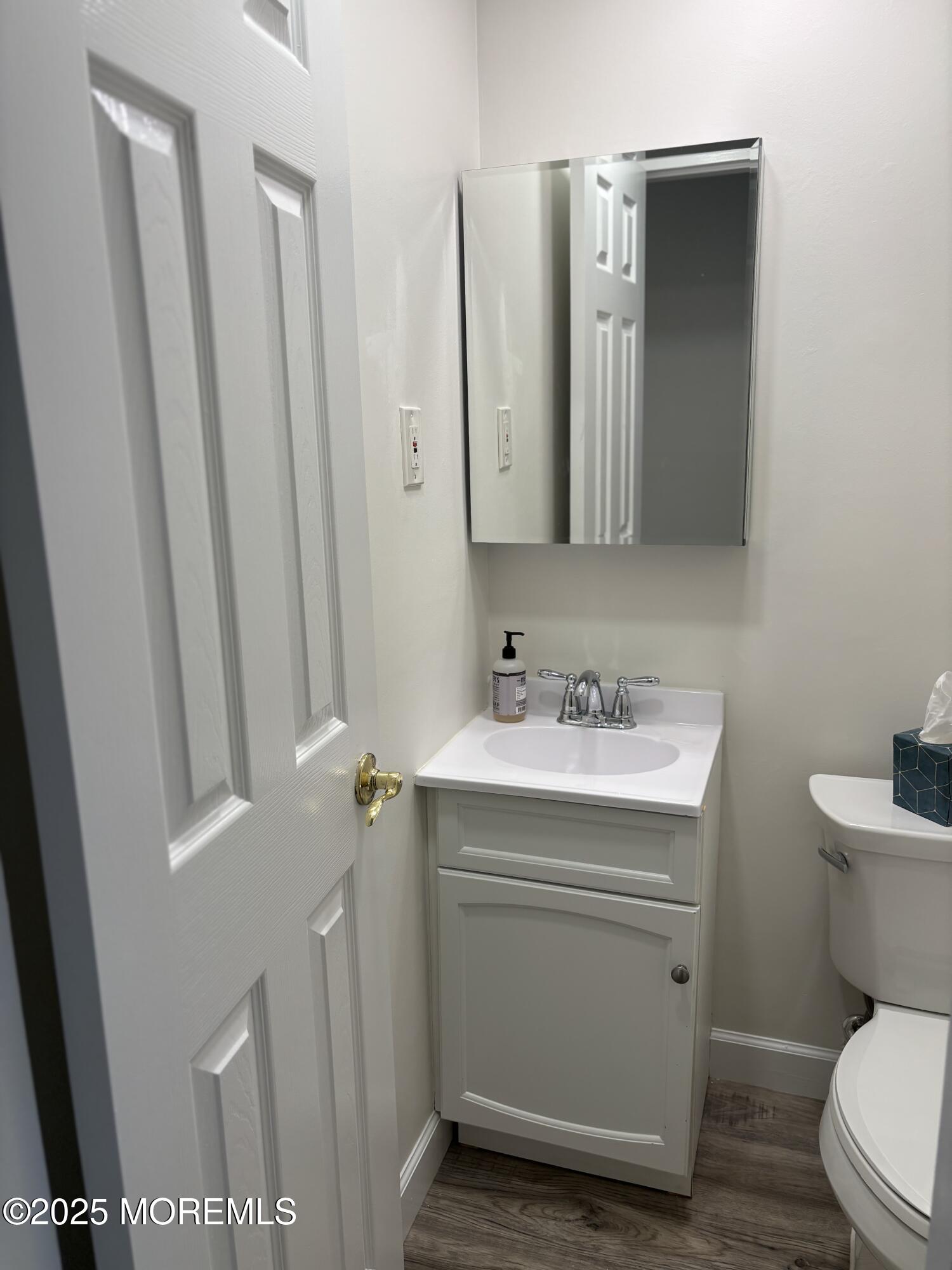 159 Village Green Way Hazlet, NJ 07730 - Photo 5 of 17 a bathroom with a granite countertop sink toilet and shower