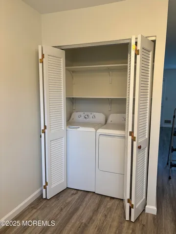 a utility room with washer and dryer