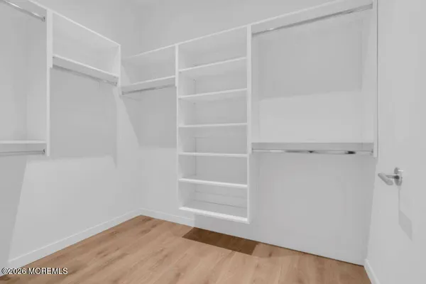 a view of an empty walk in closet
