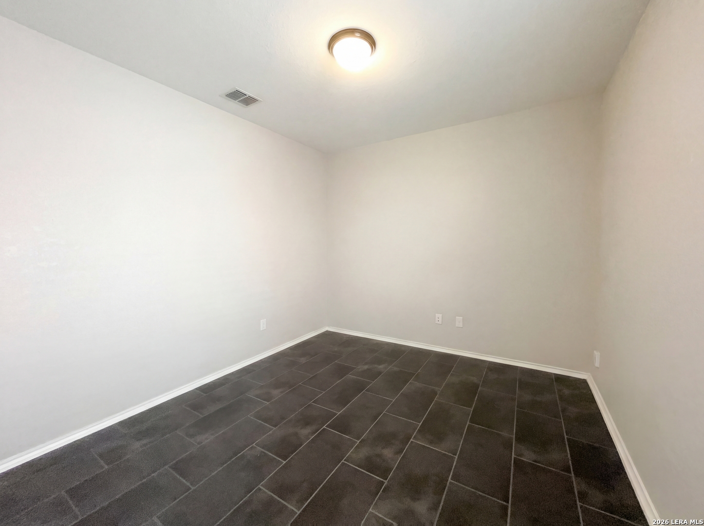 11403 Sawyer Road San Antonio, TX 78238 - Photo 12 of 20 an empty room with a bench