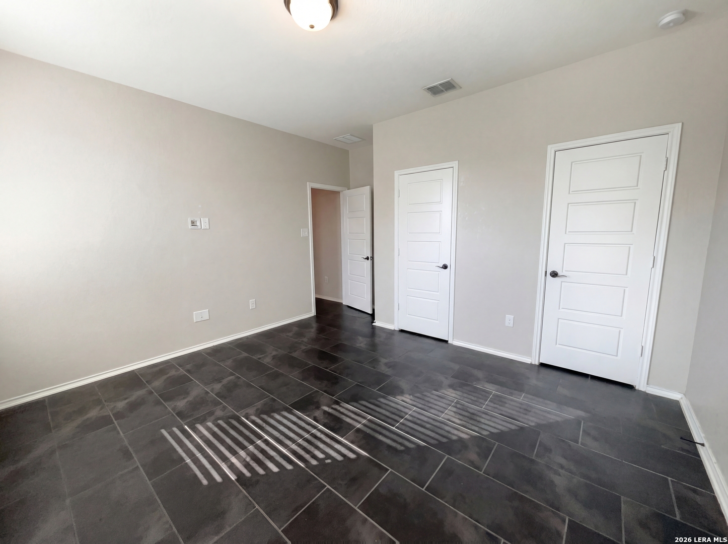 11403 Sawyer Road San Antonio, TX 78238 - Photo 4 of 20 a view of an empty room and wooden floor