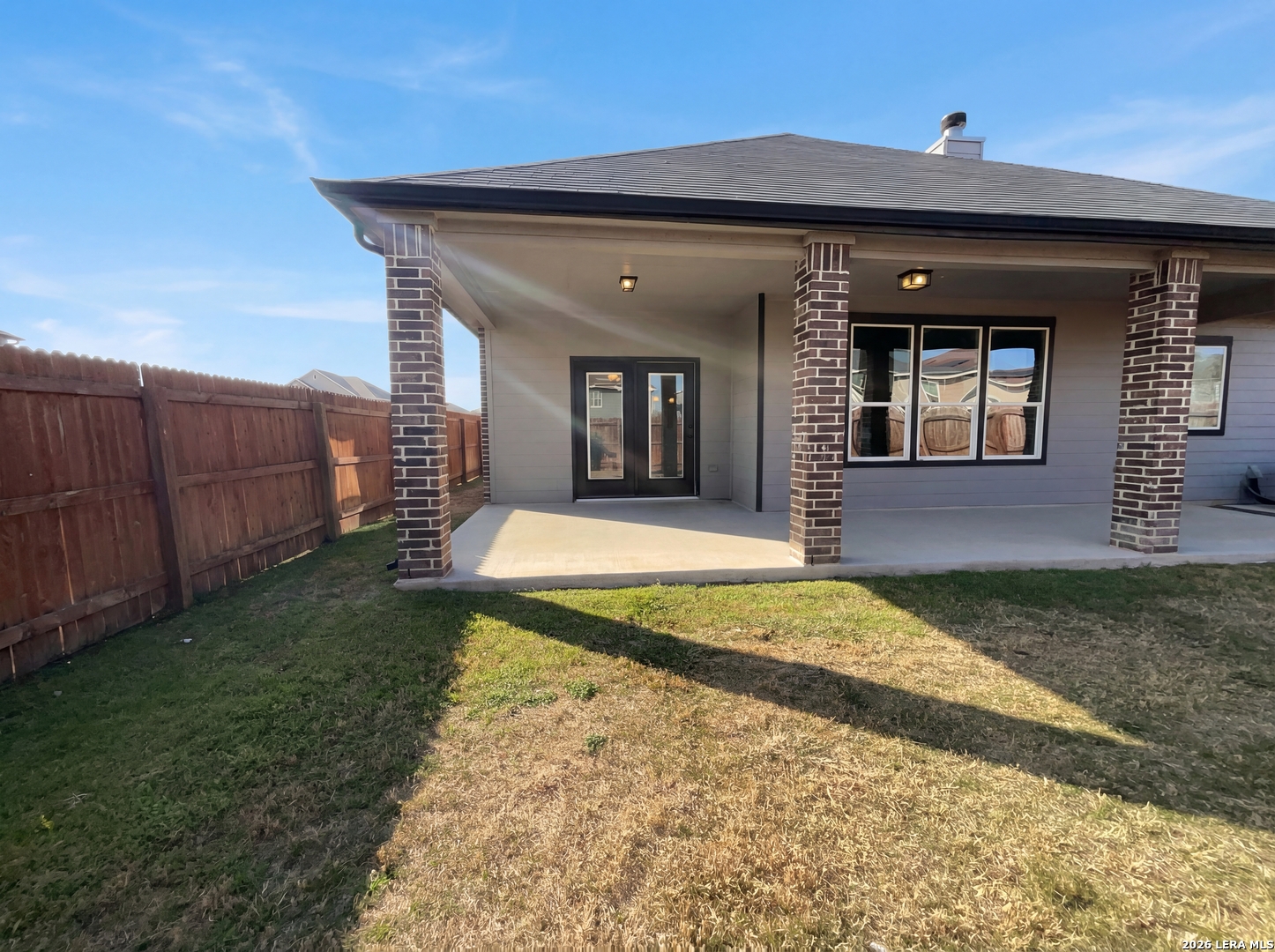 11403 Sawyer Road San Antonio, TX 78238 - Photo 5 of 20 a view of a house with a small yard and wooden fence
