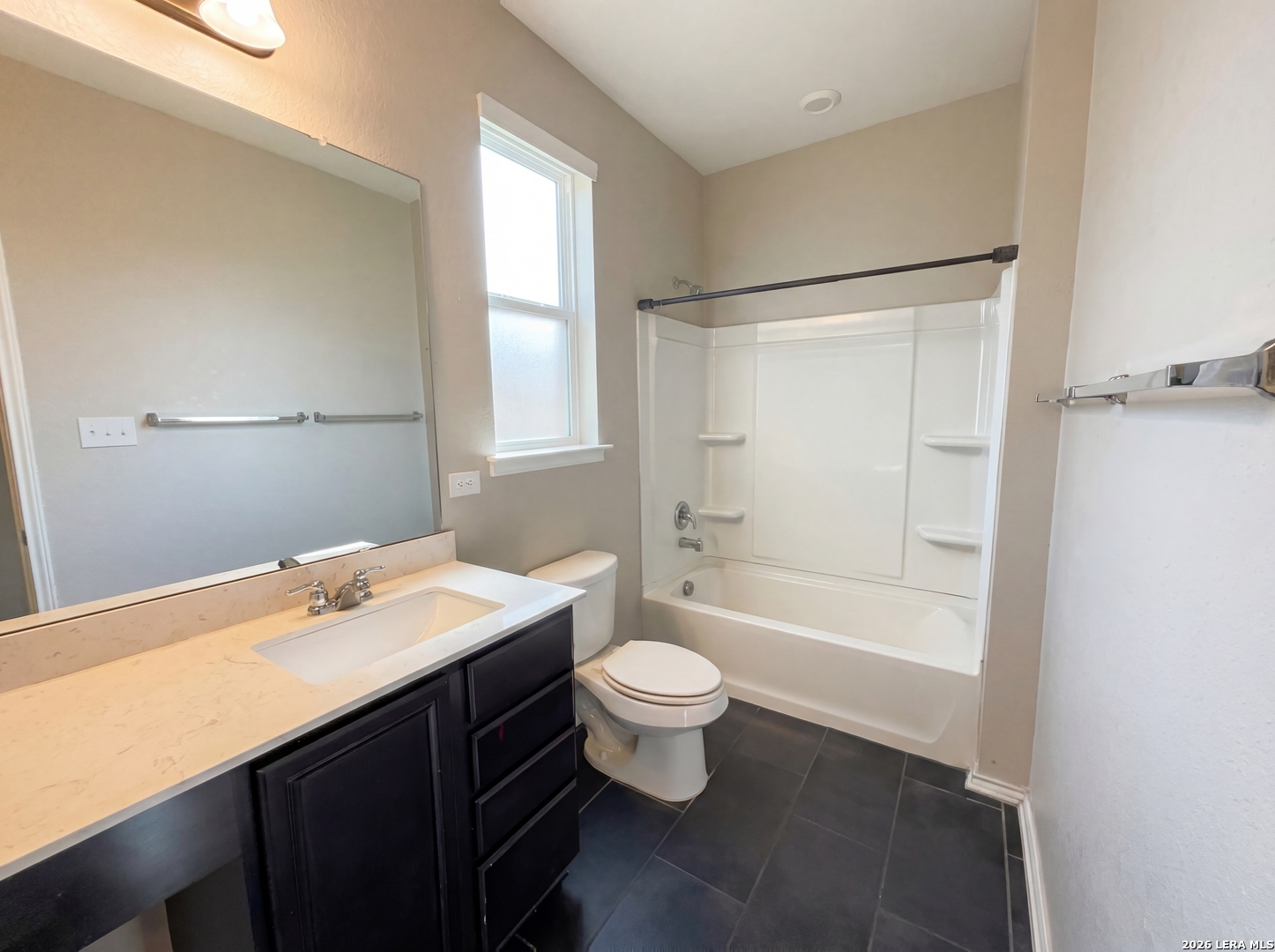 11403 Sawyer Road San Antonio, TX 78238 - Photo 8 of 20 a bathroom with a sink a toilet and shower