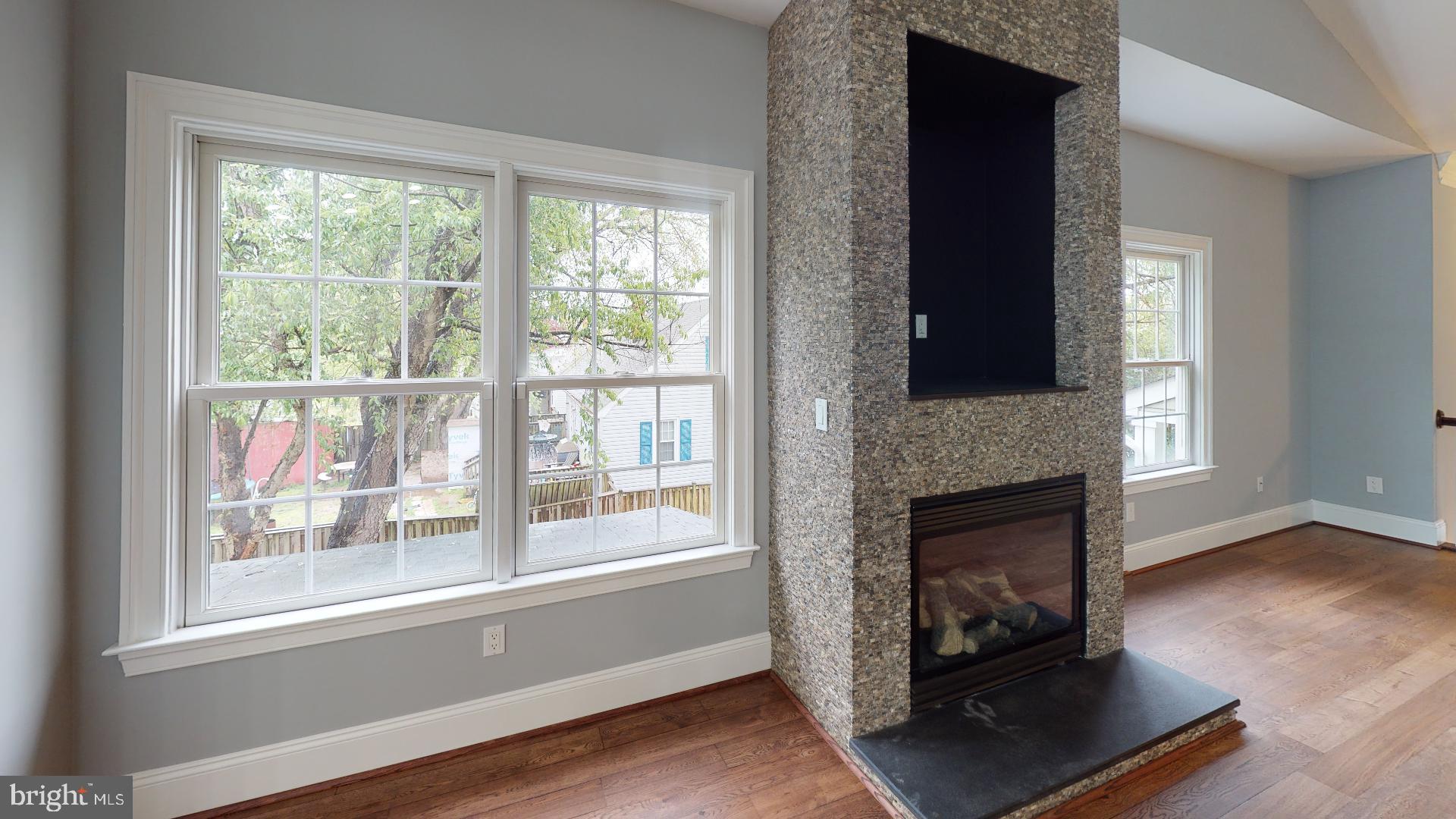174 Carroll Road Pasadena, MD 21122 - Photo 6 of 57 Impressive stone gas fireplace