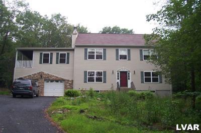 10 Old Timber Road Mount Pocono, PA 18344 - Photo 1 of 1 a front view of a house with a yard