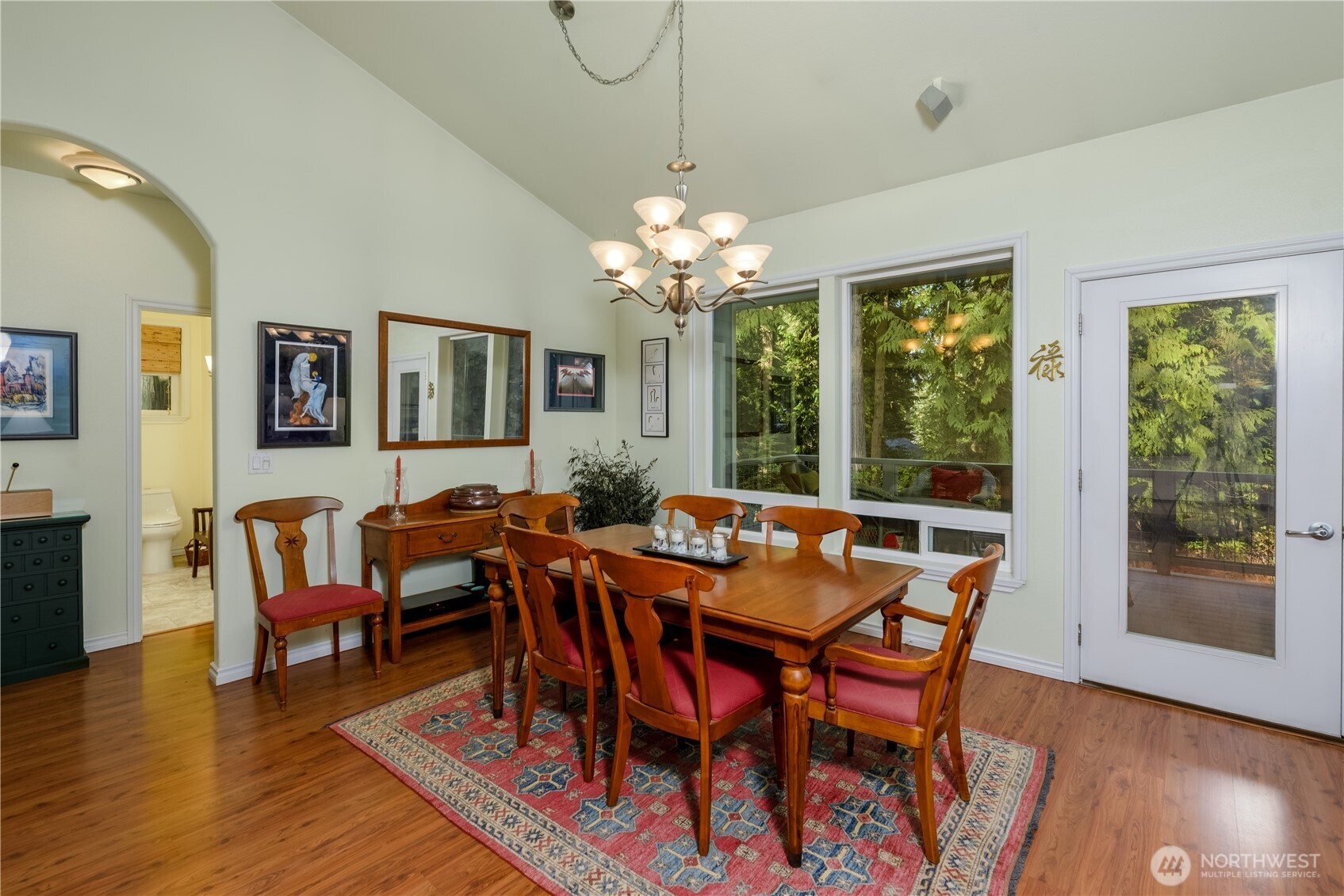 121 Buck Loop Road Sequim, WA 98382 - Photo 22 of 40 a view of a dining room with furniture window and wooden floor