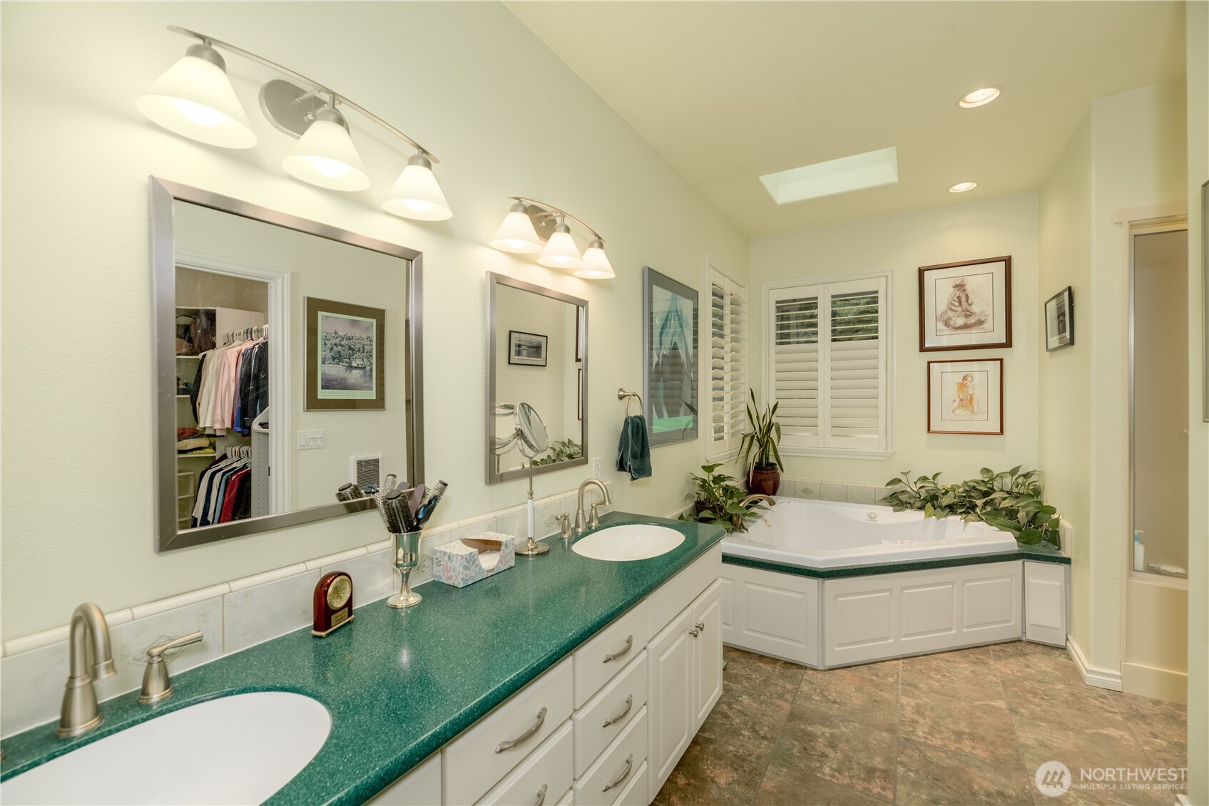 121 Buck Loop Road Sequim, WA 98382 - Photo 25 of 40 a bathroom with a double vanity sink mirror and