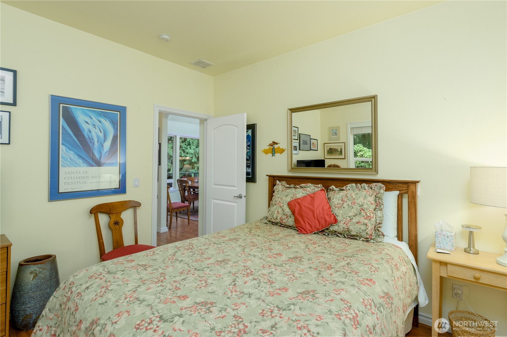 121 Buck Loop Road Sequim, WA 98382 - Photo 29 of 40 a bedroom with a bed and dresser