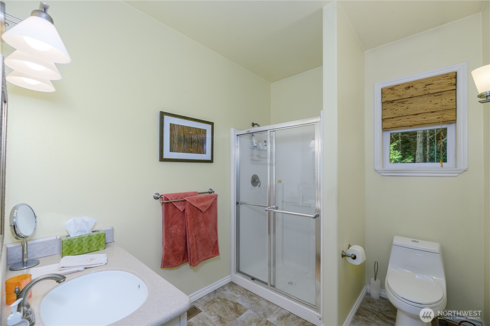 121 Buck Loop Road Sequim, WA 98382 - Photo 30 of 40 a bathroom with a toilet sink and shower