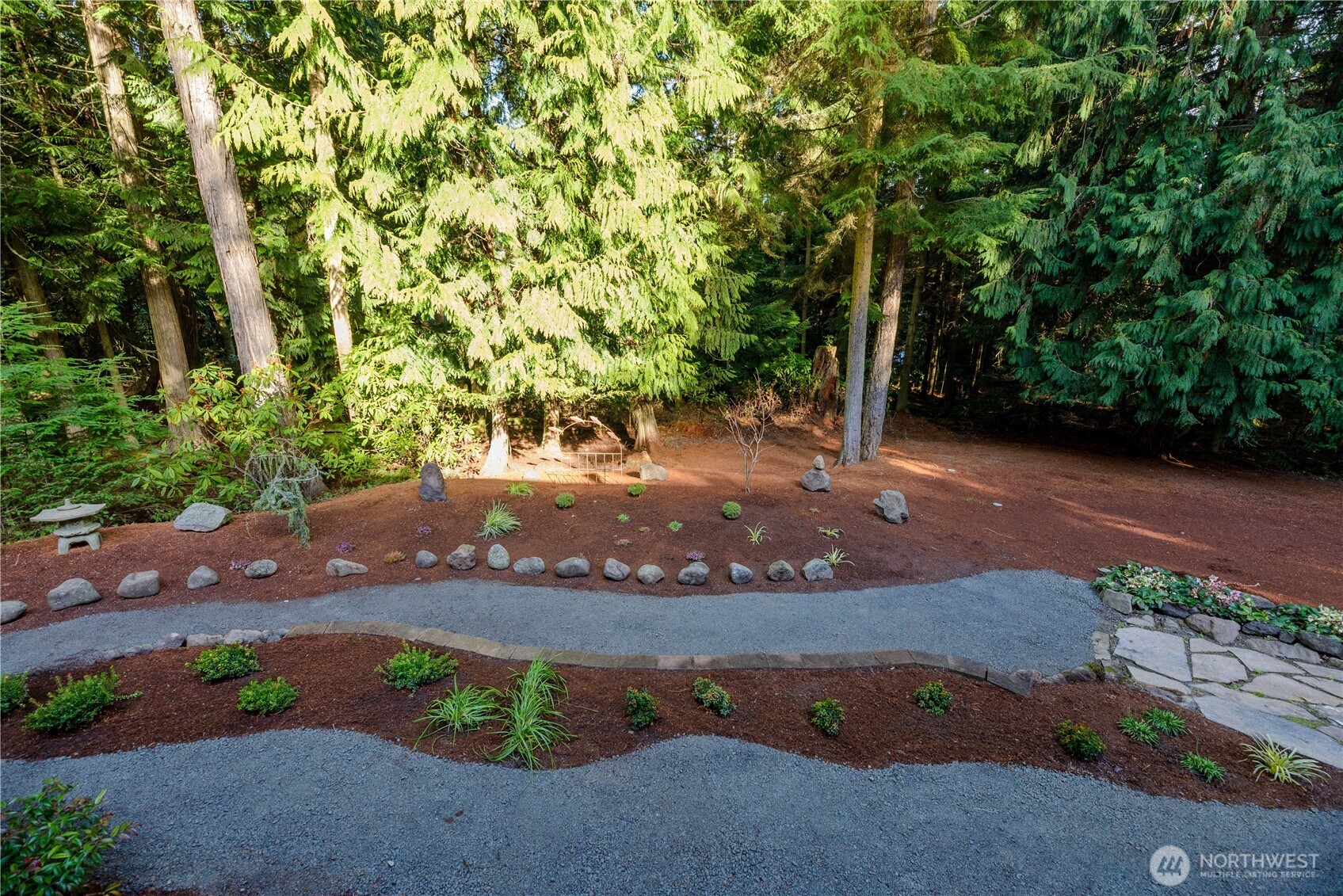121 Buck Loop Road Sequim, WA 98382 - Photo 37 of 40 a view of a pathway with a wrought fence
