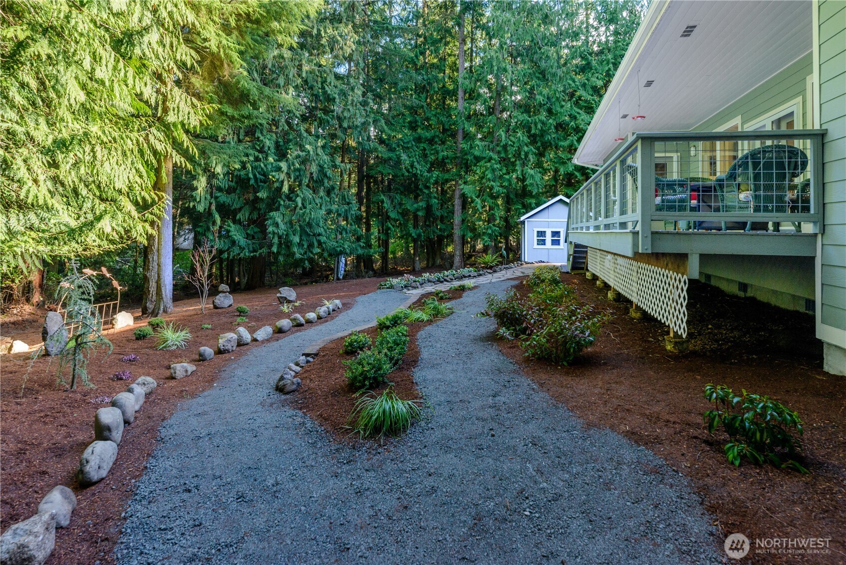 121 Buck Loop Road Sequim, WA 98382 - Photo 38 of 40 a view of a house with a yard and tree s