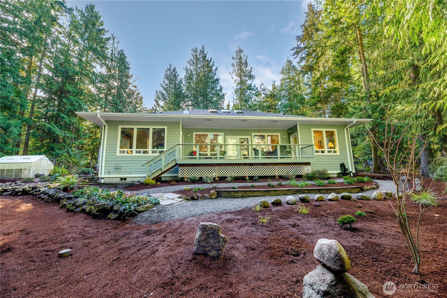 121 Buck Loop Road Sequim, WA 98382 - Photo 39 of 40 a view of a house with backyard and sitting area