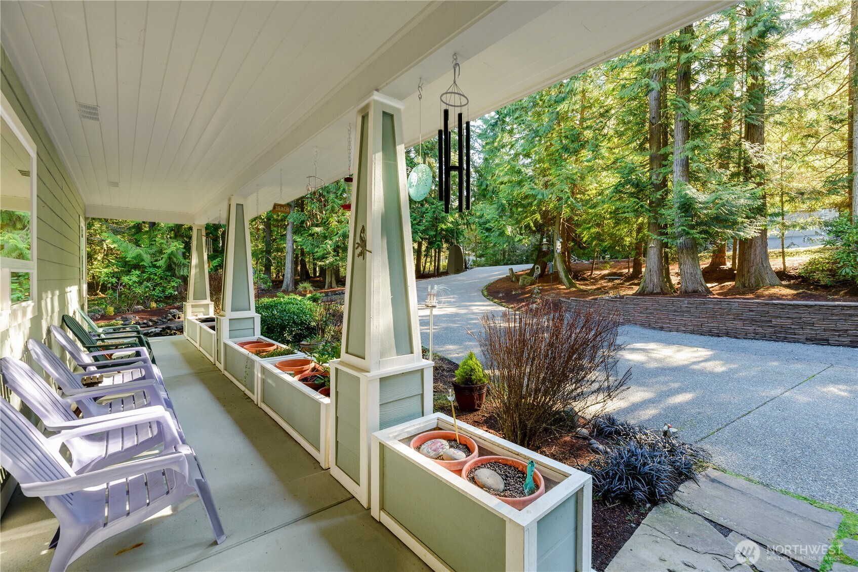 121 Buck Loop Road Sequim, WA 98382 - Photo 9 of 40 a outdoor space with the couches and large trees